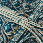 Aerial view of busy multi-level highway interchange.