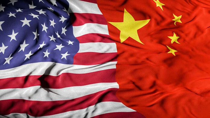 United States and Chinese flags side by side.