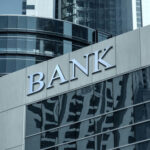 Banks Target Cartel Cash — What’s Next? Bank building facade with large sign and glass windows