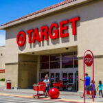 Entrance of a Target store with shoppers and shopping carts