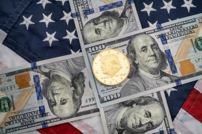 shutterstock1373686376 American flag background with hundred dollar bills and coin