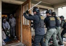 Police Go Full Chainsaw — Rules Nowhere Law enforcement officers conducting a property recovery raid